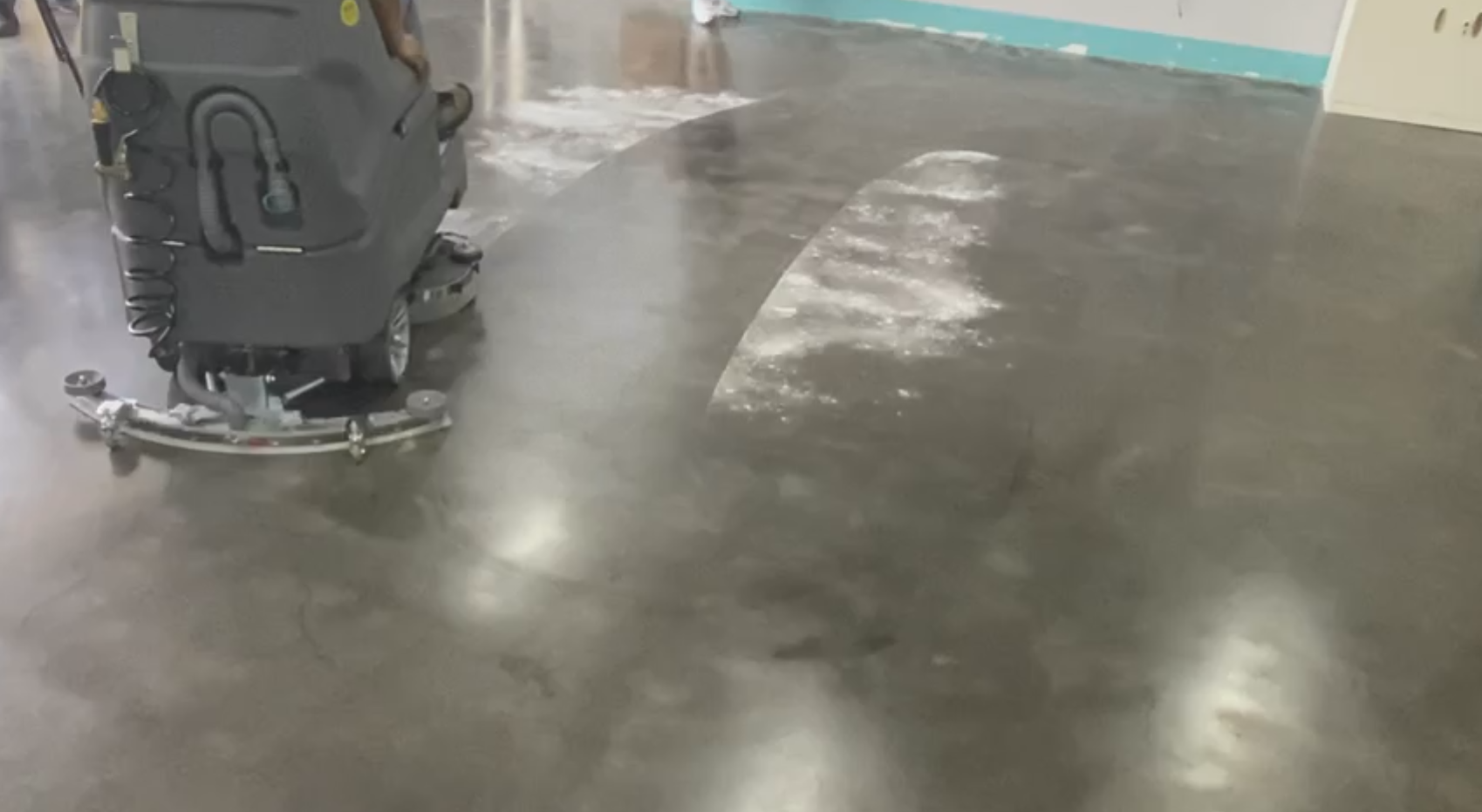 CE-certified parking garage scrubber in action